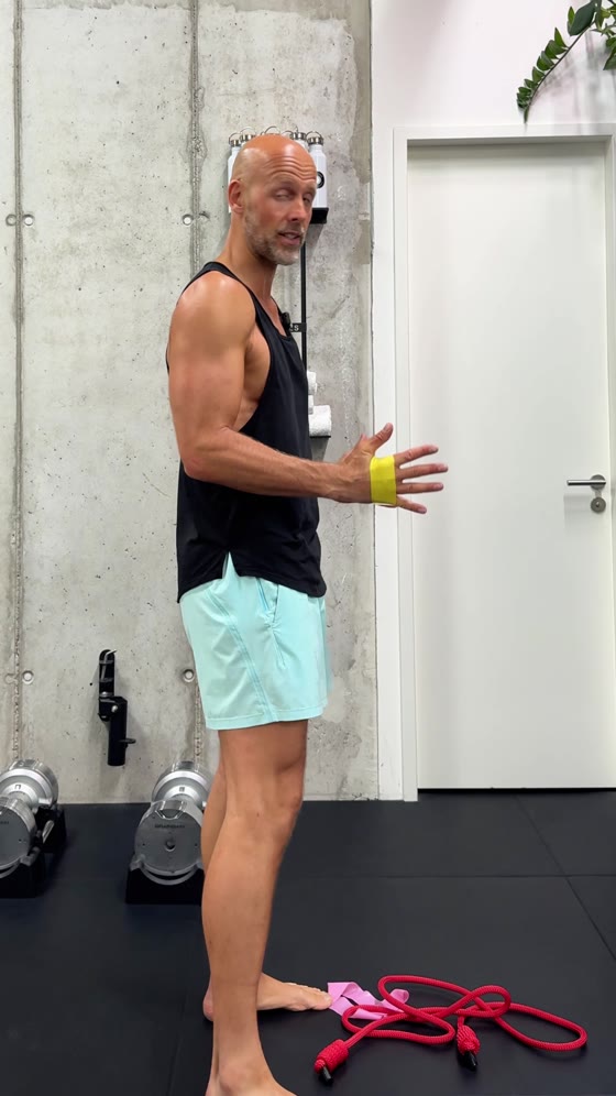 Starting position: mini band around both wrists, elbows pinned to your sides at a right angle. From here you rotate out until your forearms are parallel to each other.